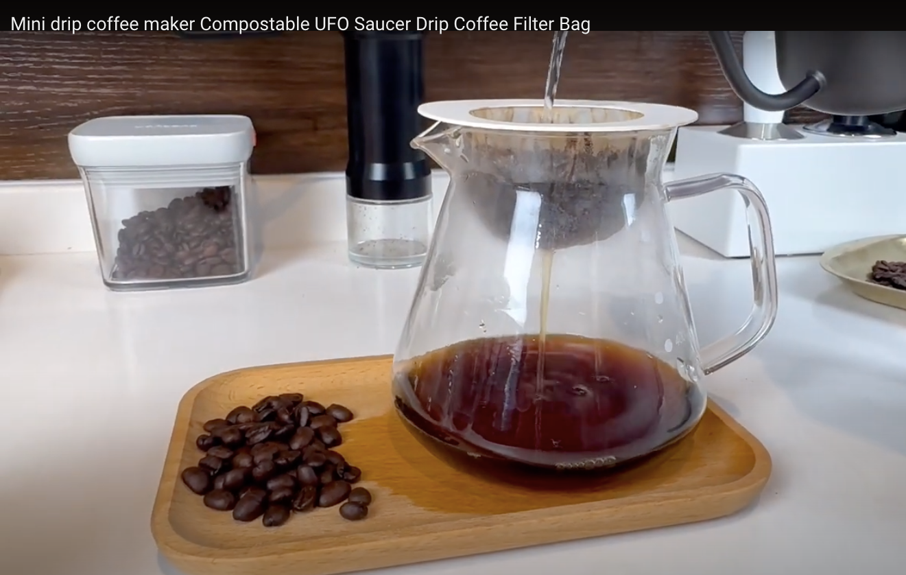 Load video: Mini drip coffee maker Compostable UFO Saucer Drip Coffee Filter Bag
